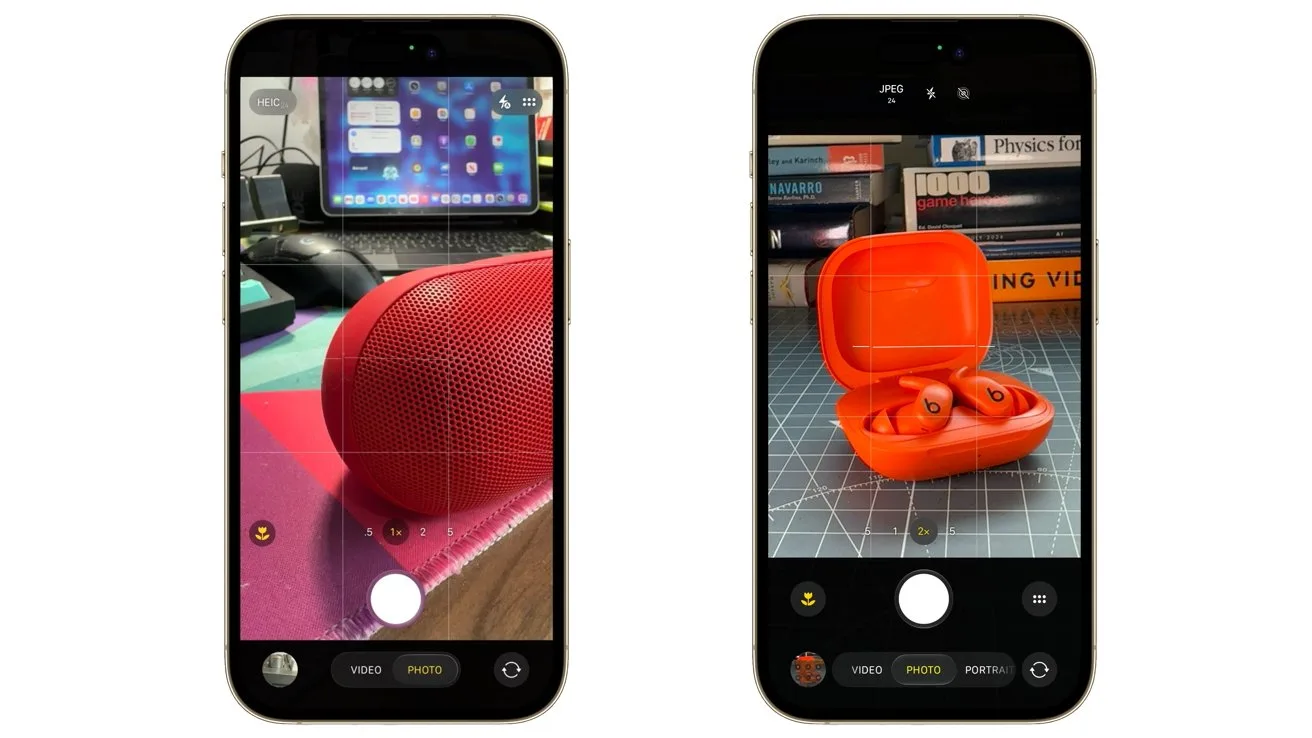 Two smartphones displaying camera apps; left phone focuses on a red portable speaker on a colorful desk, right phone focuses on an open red wireless earbuds case on a cutting mat.
