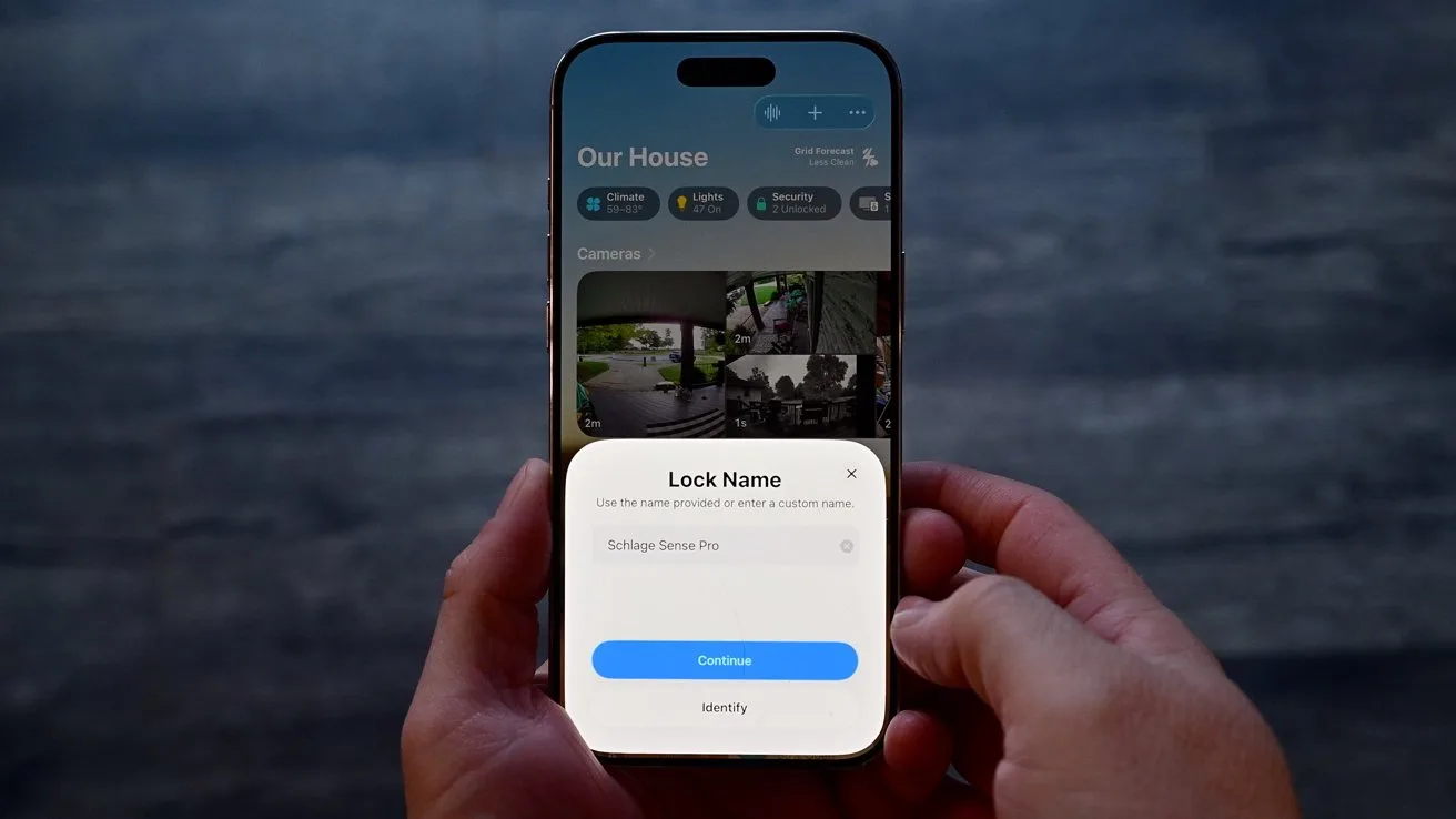 Person holding a smartphone showing a home security app screen, with a lock setup dialog open labeled Lock Name and buttons for Continue and Identify