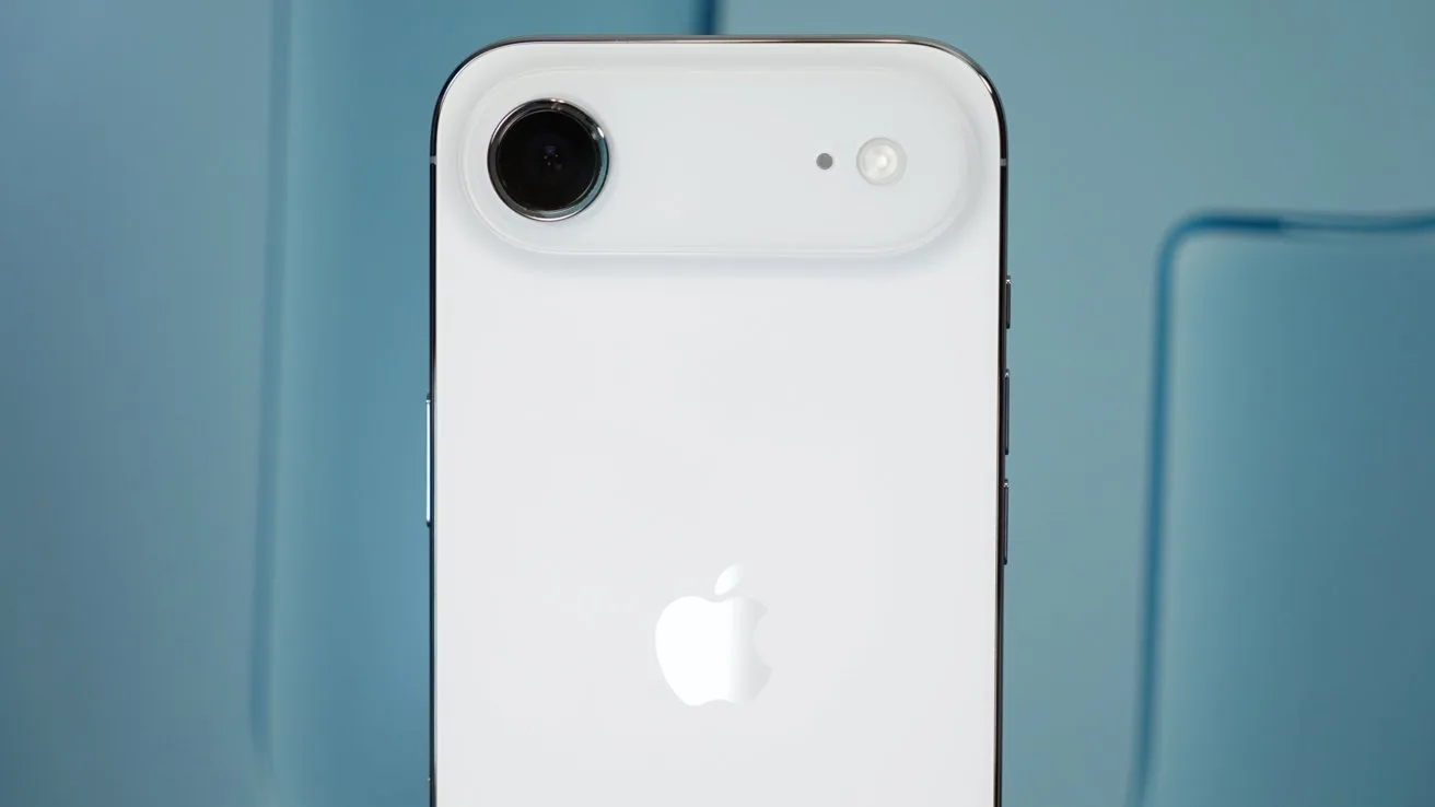Light blue iPhone Air back with a single rear camera and flash on a raised top-left module, centered Apple logo, against a soft blue geometric background