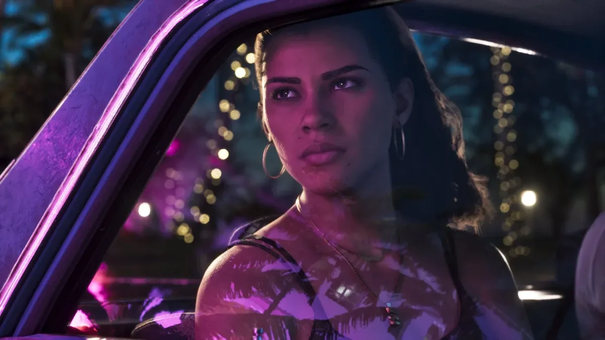 Lucia looking outside from a car window in GTA 6