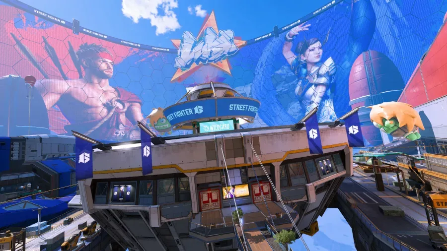 The official promo image shows the Apex Legends map Olympus with various Street Fighter 6 cosmetic decorations.