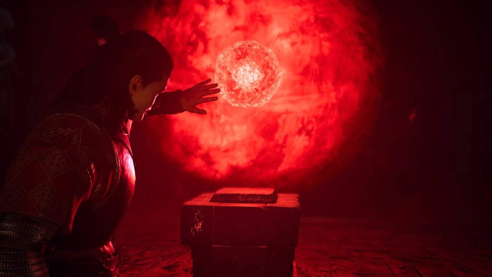 Coen stands in front of the red glowing orb in The Blood of Dawnwalker