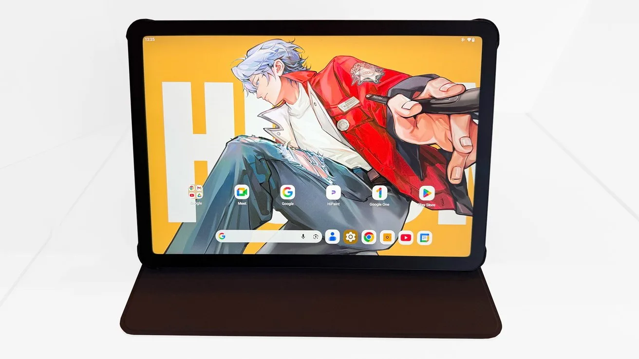 Tablet in a dark folio case standing upright, displaying a colorful anime-style character on a yellow background with app icons arranged along the bottom of the screen