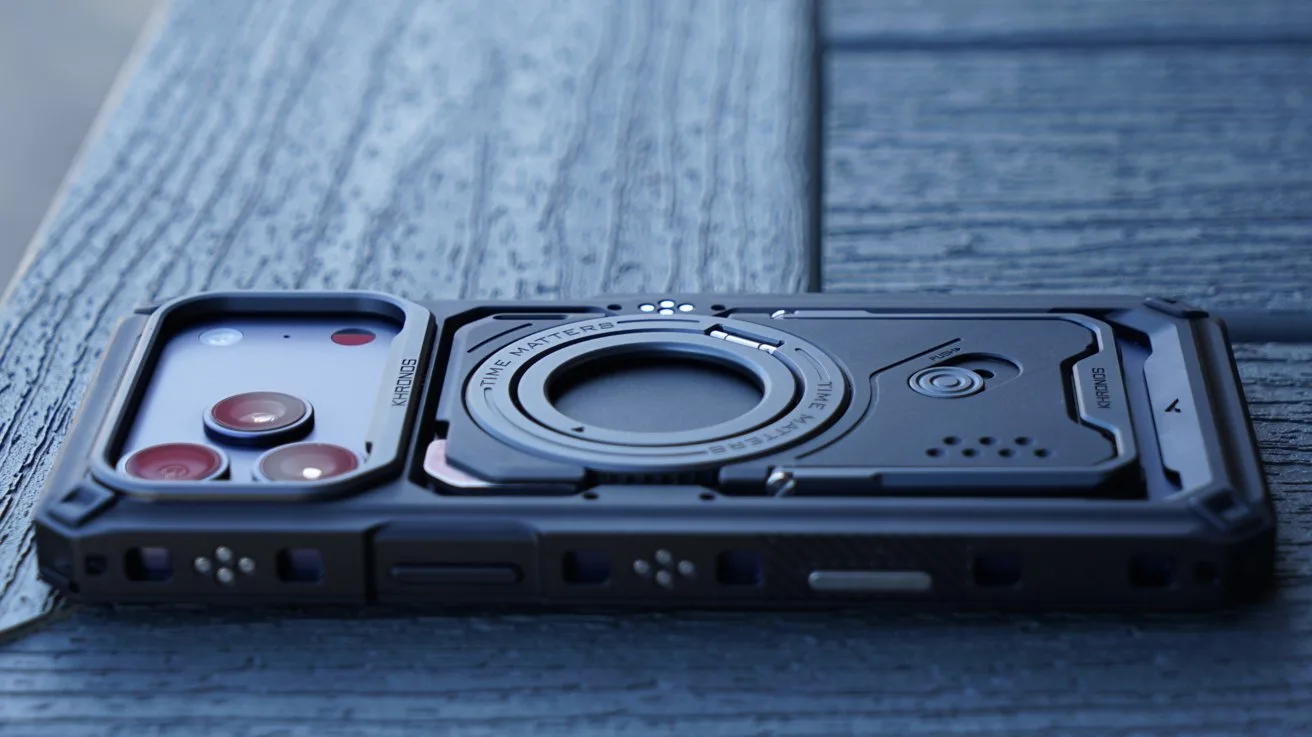 The Tilta Khronos case for iPhone 17 Pro Max with a backplate inserted, showing rugged angular design and metal contacts where accessories mount