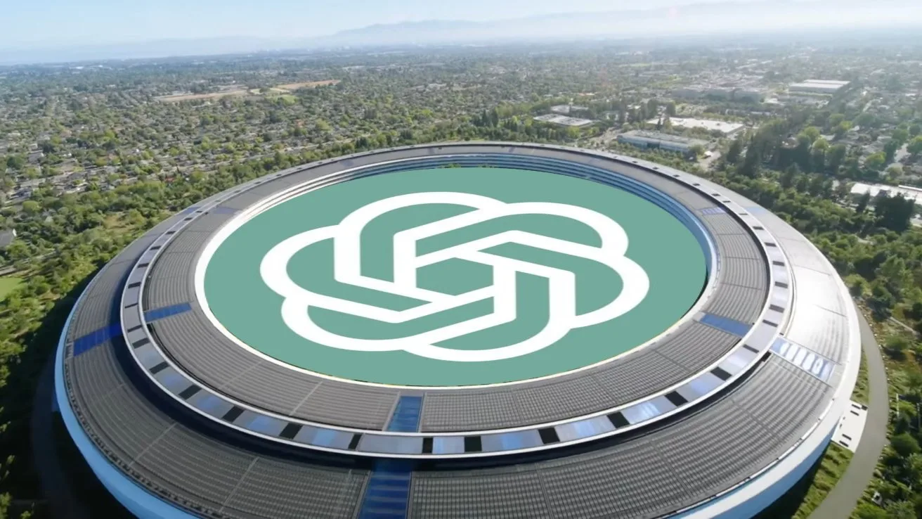 Aerial view of a large circular office campus surrounded by trees, with a huge teal rooftop featuring the OpenAI logo in white at the center