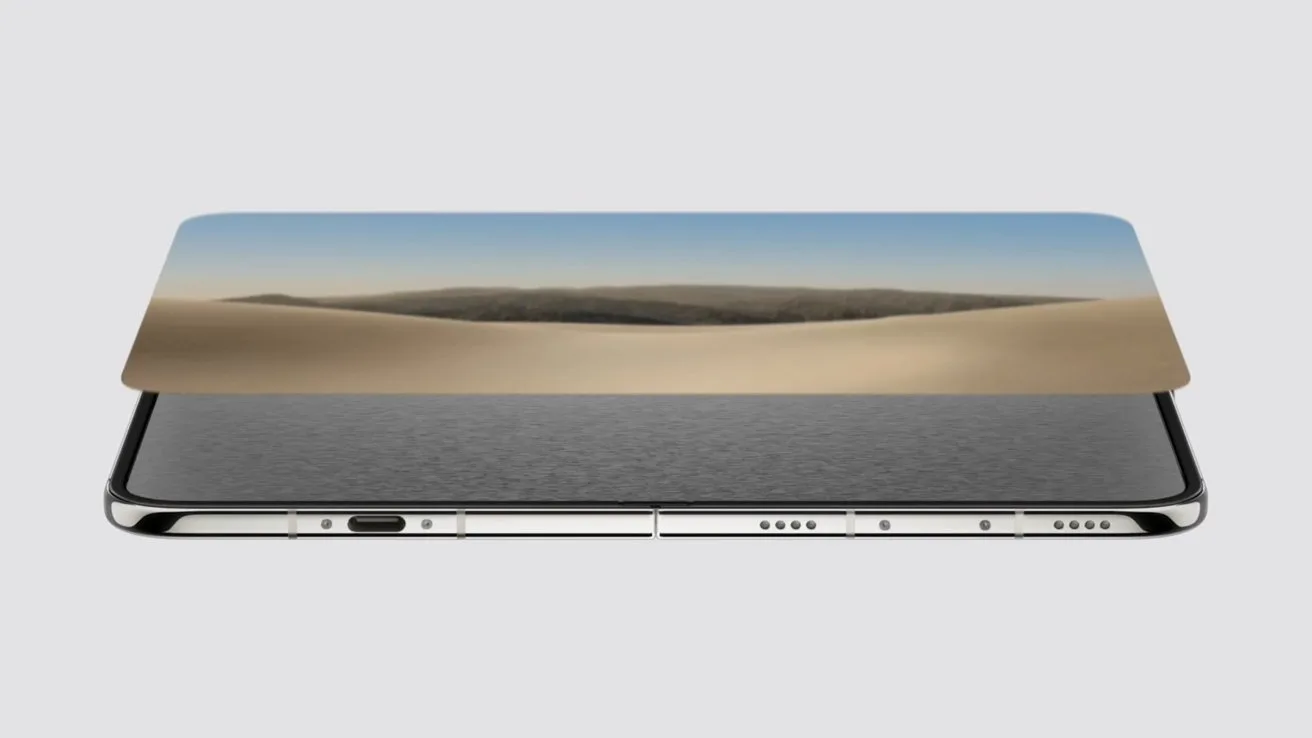 iPhone Duo lying flat, screen facing up, displaying a desert landscape with sand dunes and blue sky, emphasizing thin bezel and sleek metallic edges against a plain light gray background