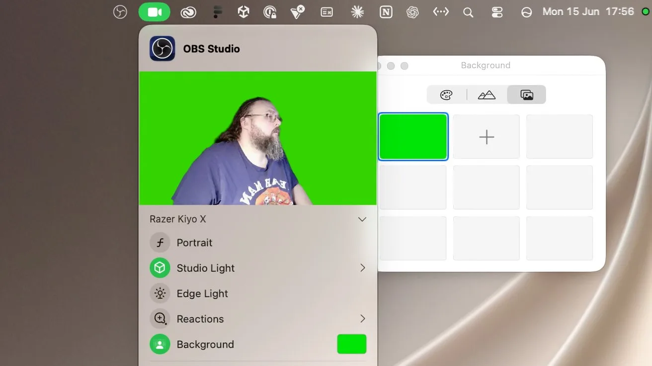 Mac desktop showing OBS Studio with a webcam preview of a bearded person against a bright green chroma key background and settings panel for portrait, lighting, reactions, and background options