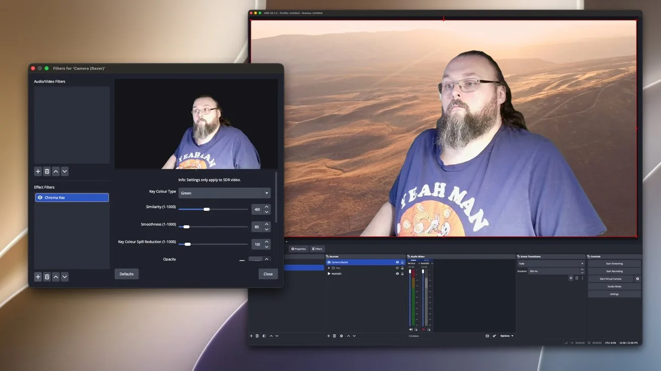 Screen capture of streaming software showing a bearded man in a Yeah Man T-shirt on a desert landscape background, with settings panel open for adjusting video filters and effects