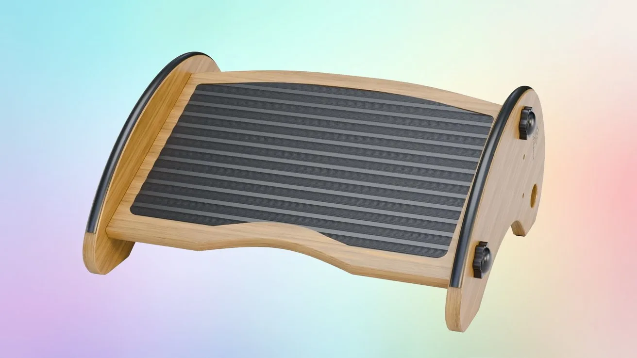 Adjustable wooden footrest with curved sides and a ribbed black surface, shown against a soft pastel gradient background