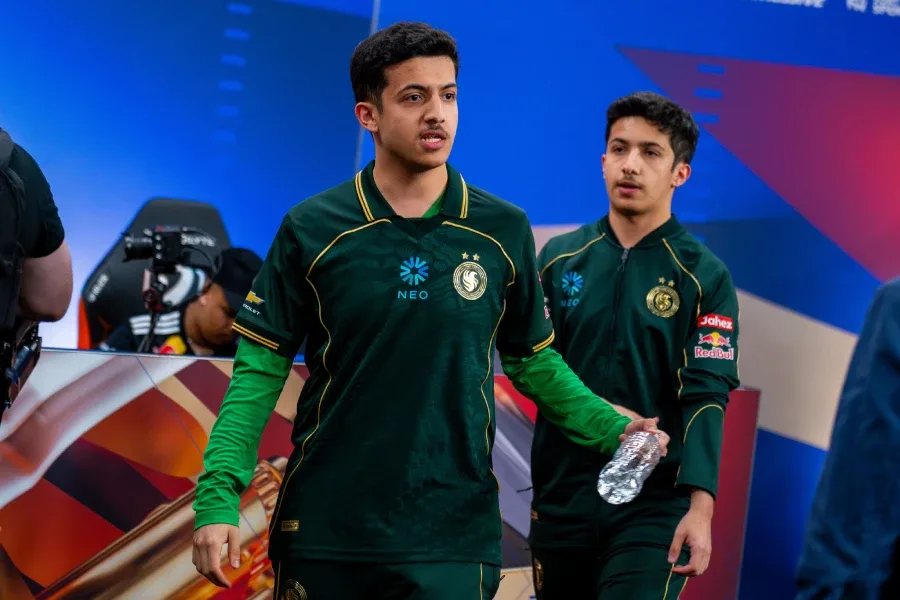 It’s a photo of the pro Rocket League players from Team Falcons: Rw9 and Kiileerrz. Walking on the stage of the RLCS 2026 World Finals.